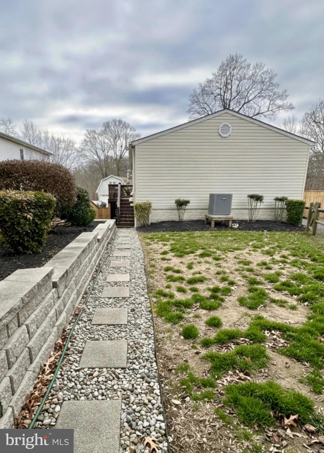 3906 1st Street North Beach, MD 20714 - Photo 4 of 4 a view of a terrace with yard