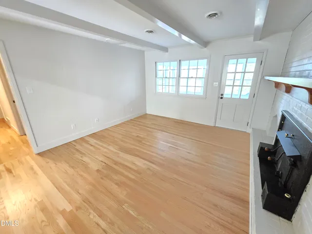 a view of an empty room and window