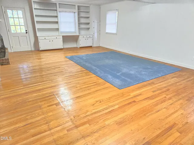 a view of a room with a flat screen tv