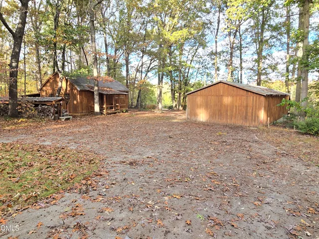 a house with trees in front of it