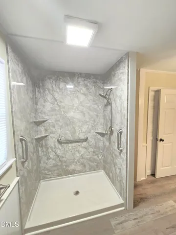 a bathroom with a bath tub