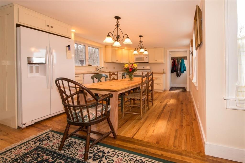 674 Wiscasset Road Boothbay, ME 04537 - Photo 4 of 19 Eat-in kitchen with wood cupboards...