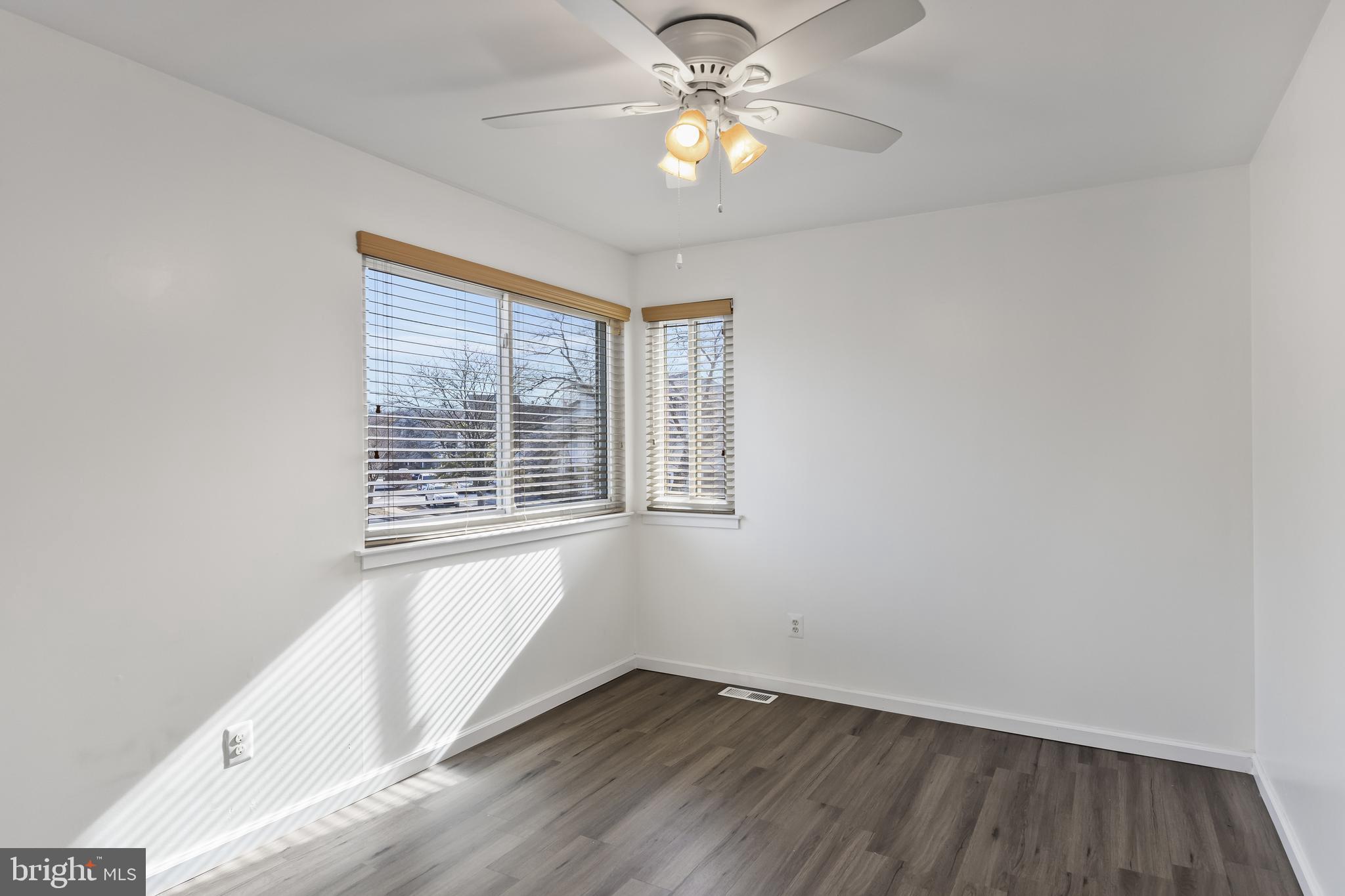 117 Sandra Road Voorhees, NJ 08043 - Photo 15 of 25 wooden floor in an empty room with a window