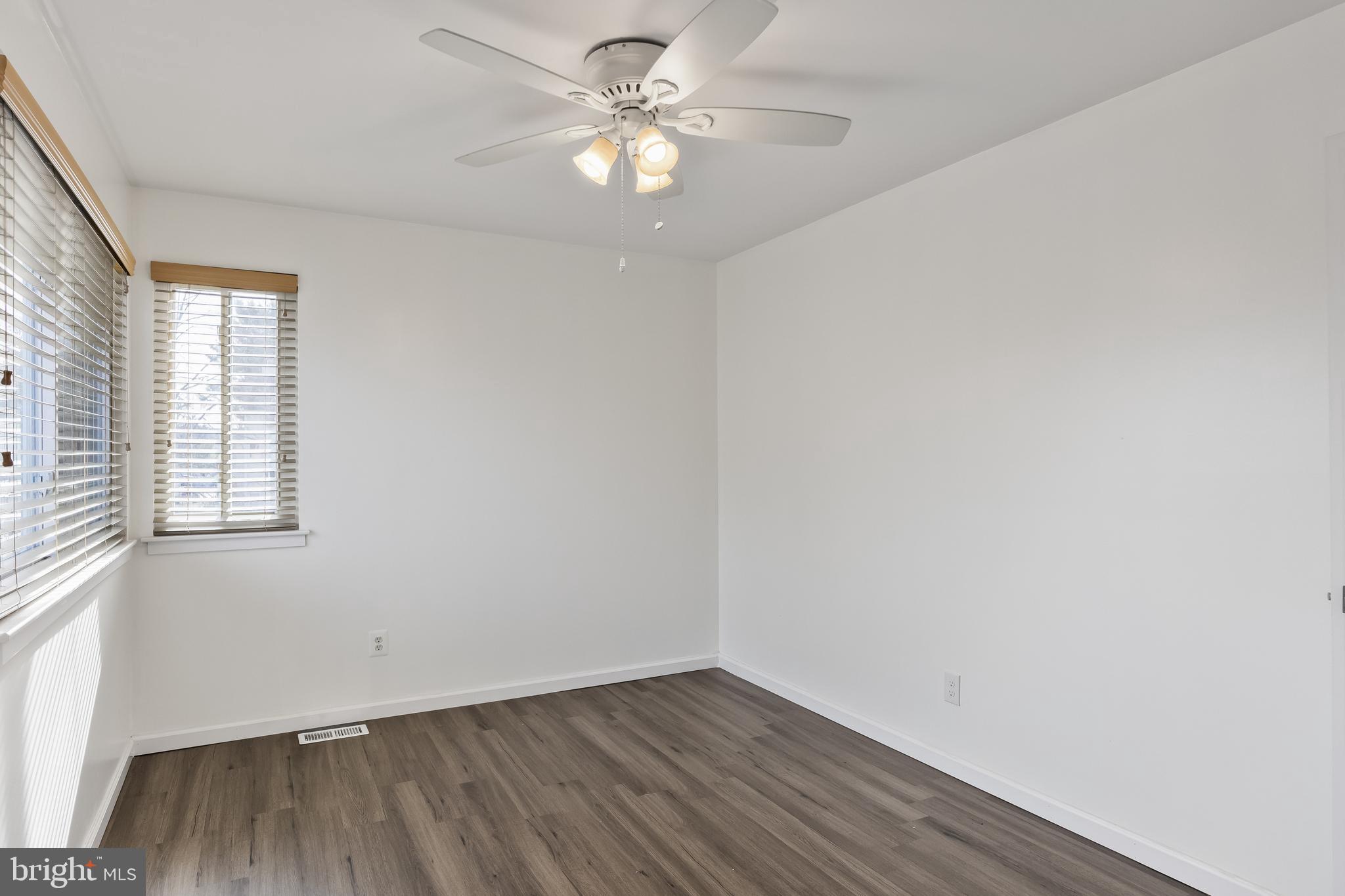 117 Sandra Road Voorhees, NJ 08043 - Photo 16 of 25 an empty room with a window and ceiling fan