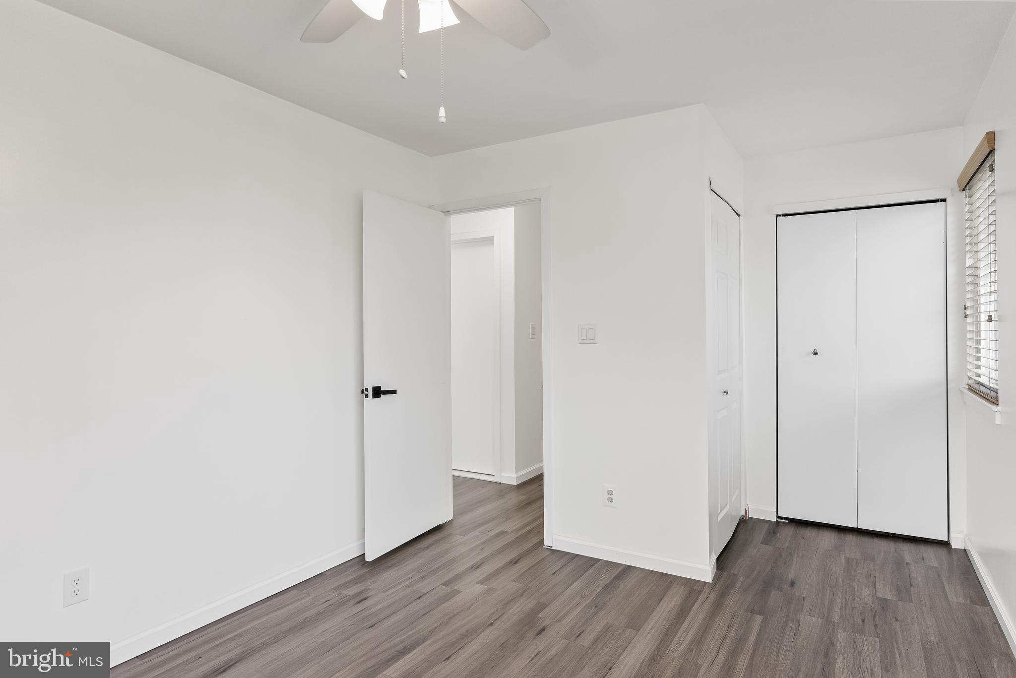 117 Sandra Road Voorhees, NJ 08043 - Photo 17 of 25 a view of an empty room with wooden floor