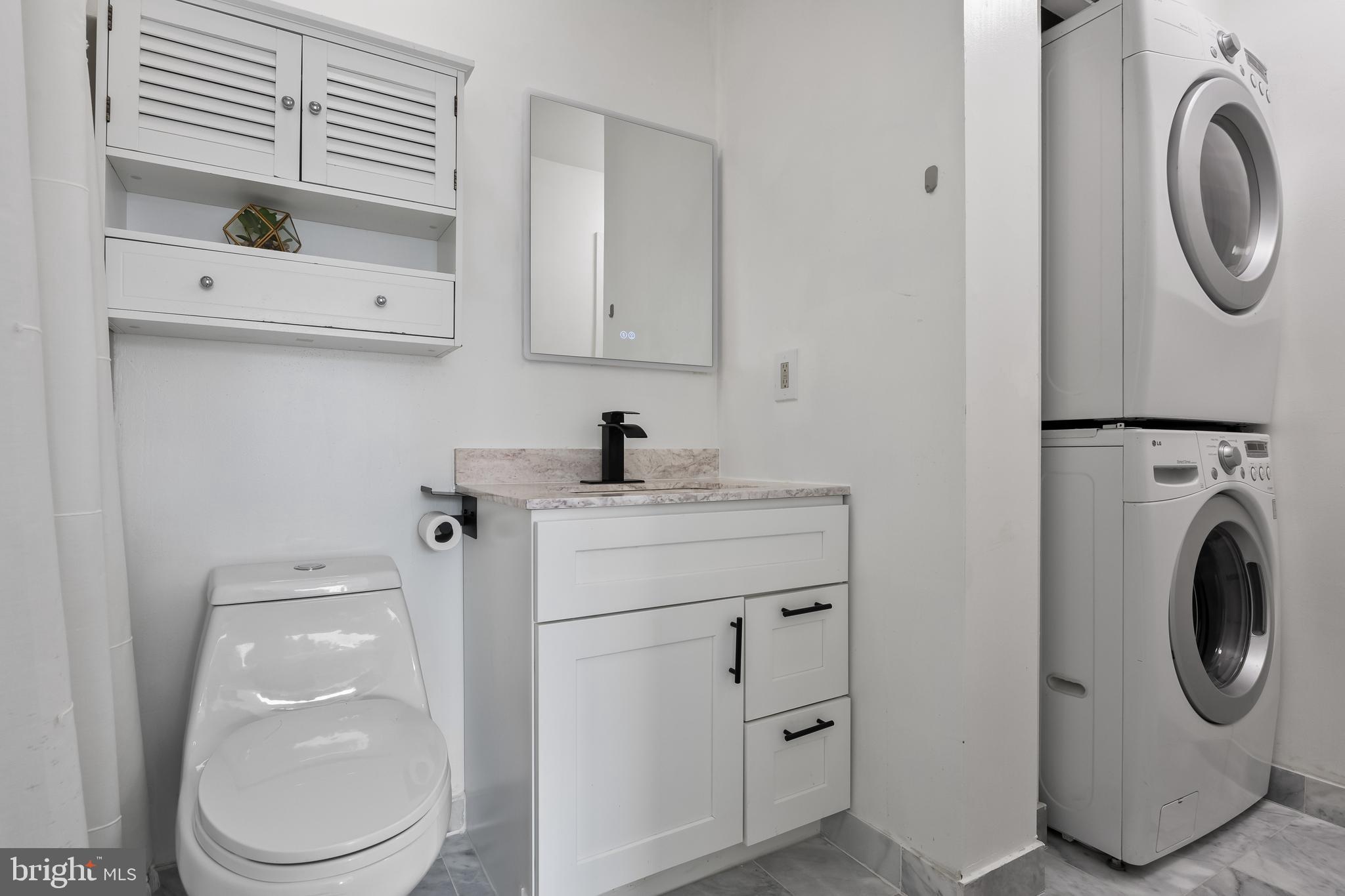 117 Sandra Road Voorhees, NJ 08043 - Photo 21 of 25 a utility room with dryer and washer