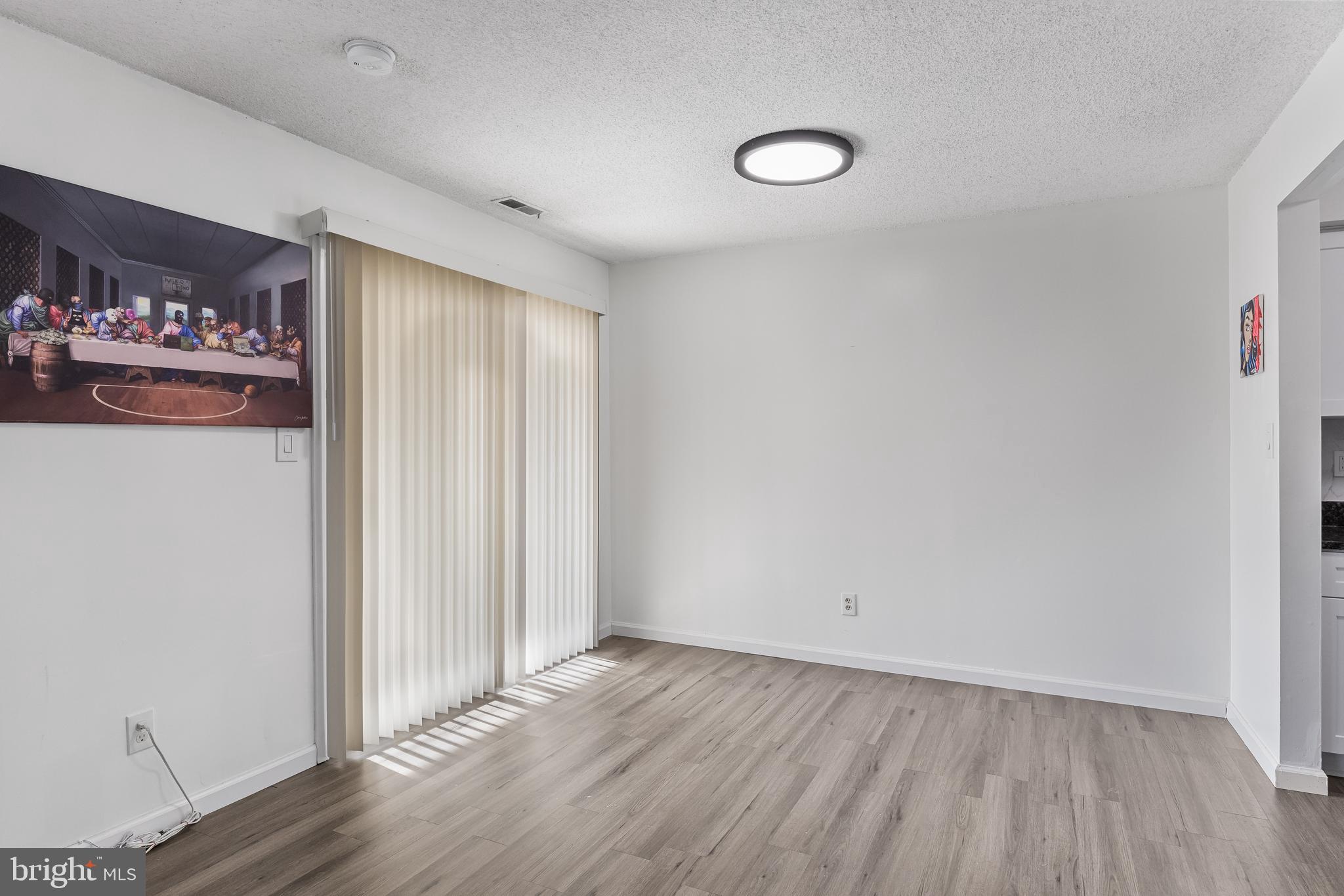 117 Sandra Road Voorhees, NJ 08043 - Photo 10 of 25 a view of an empty room and wooden floor