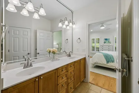 a white bath tub sitting next to a window