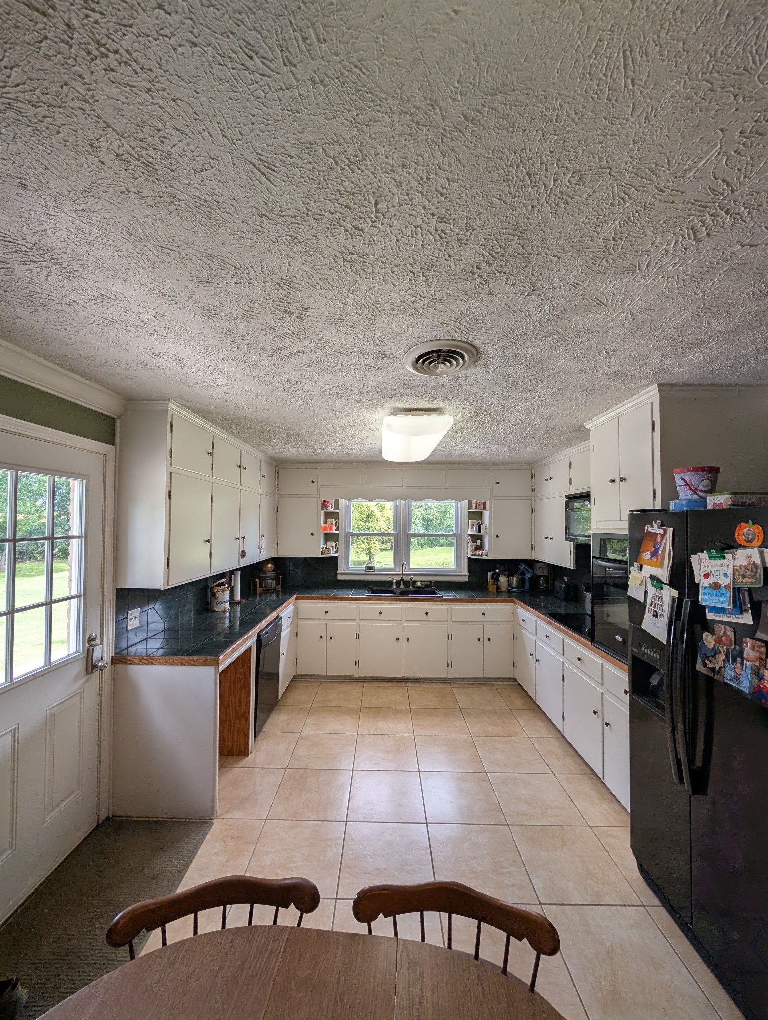 6780 Salubria Springs Road Pembroke, KY 42266 - Photo 7 of 18 a large kitchen with a large counter top appliances and cabinets