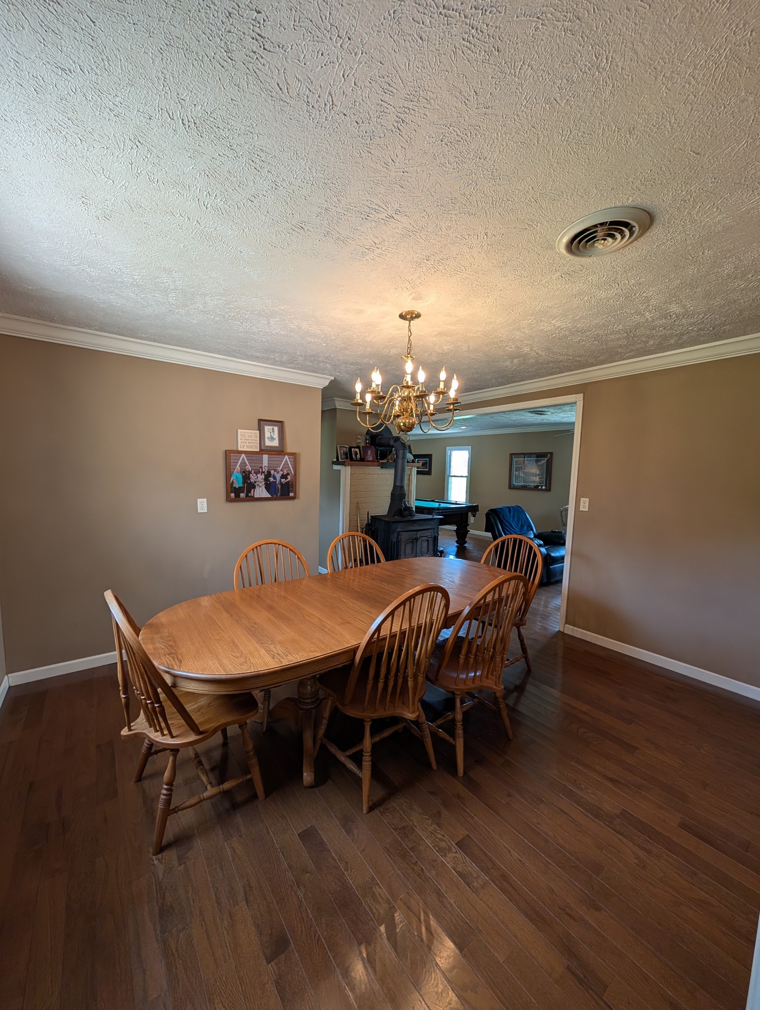 6780 Salubria Springs Road Pembroke, KY 42266 - Photo 8 of 18 a dining room with furniture and wooden floor