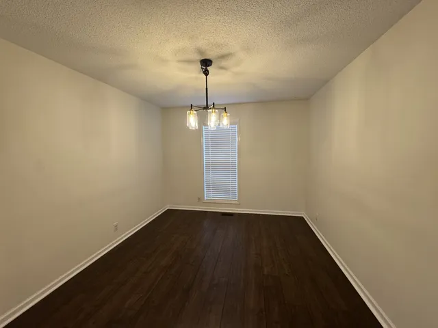 a view of an empty room with window