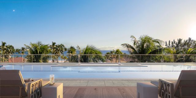 a view of a balcony with lake view