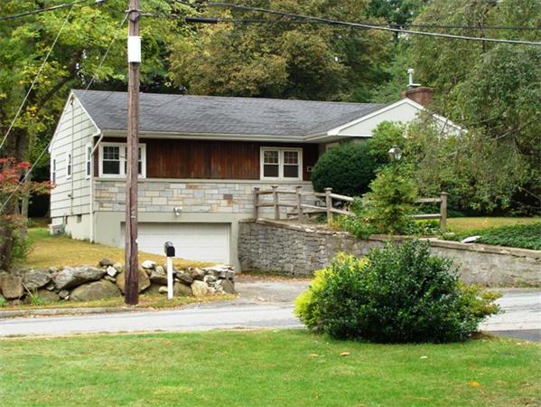 39 Bancroft Road Andover, MA 01810 - Photo 1 of 13 a view of a house with a yard porch and sitting area