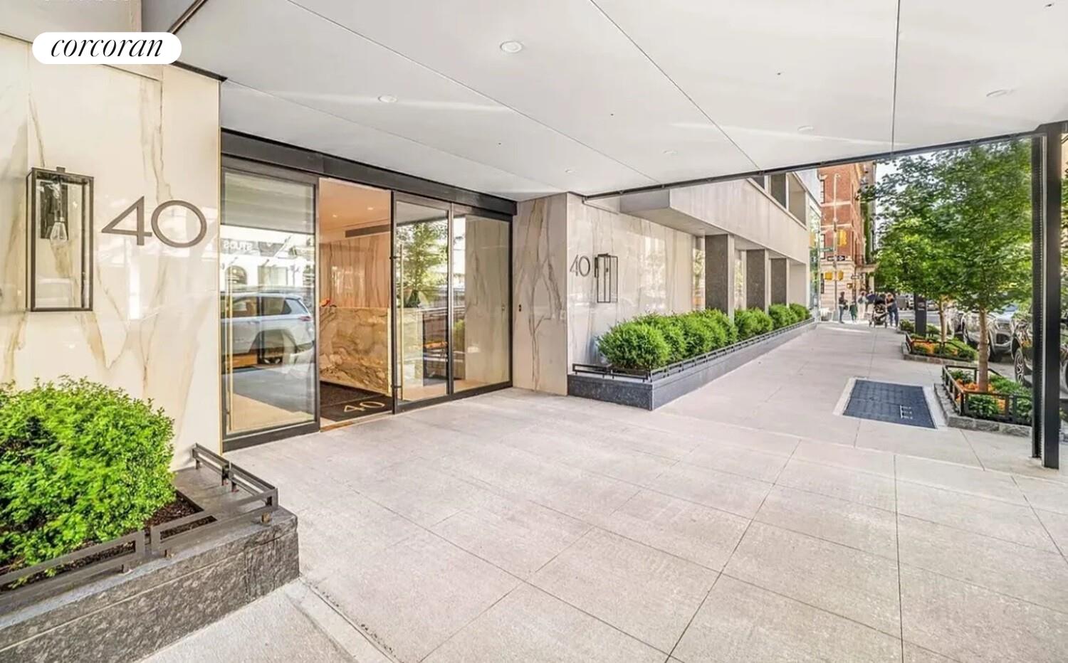 40 East 78th Street, Unit 10B Manhattan, NY 10075 - Photo 6 of 9 a view of a house with a garden