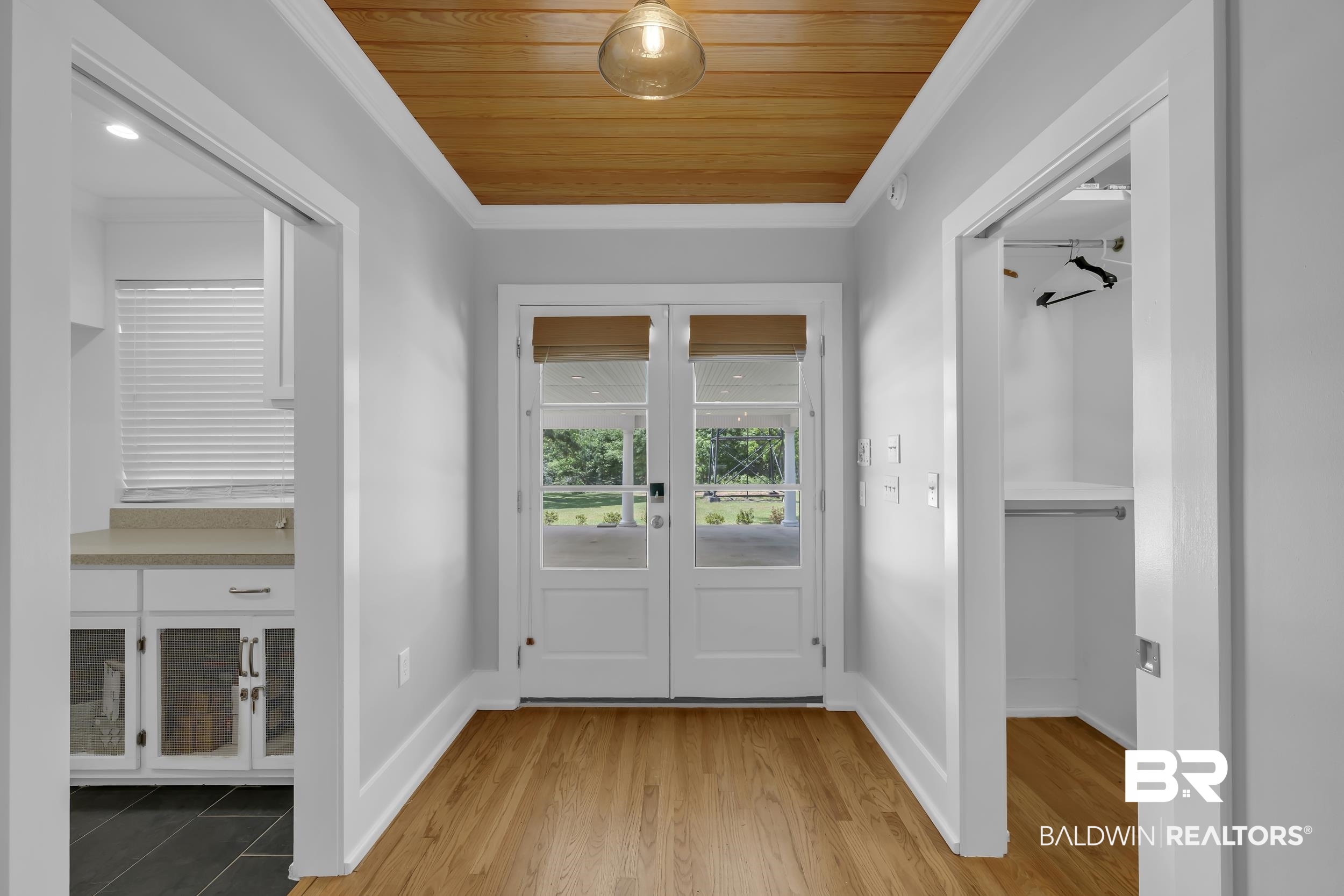43199 Pine Grove Road Bay Minette, AL 36507 - Photo 37 of 71 Foyer featuring wood-finish flooring, a planked wood ceiling, and a contemporary pendant light fixture
