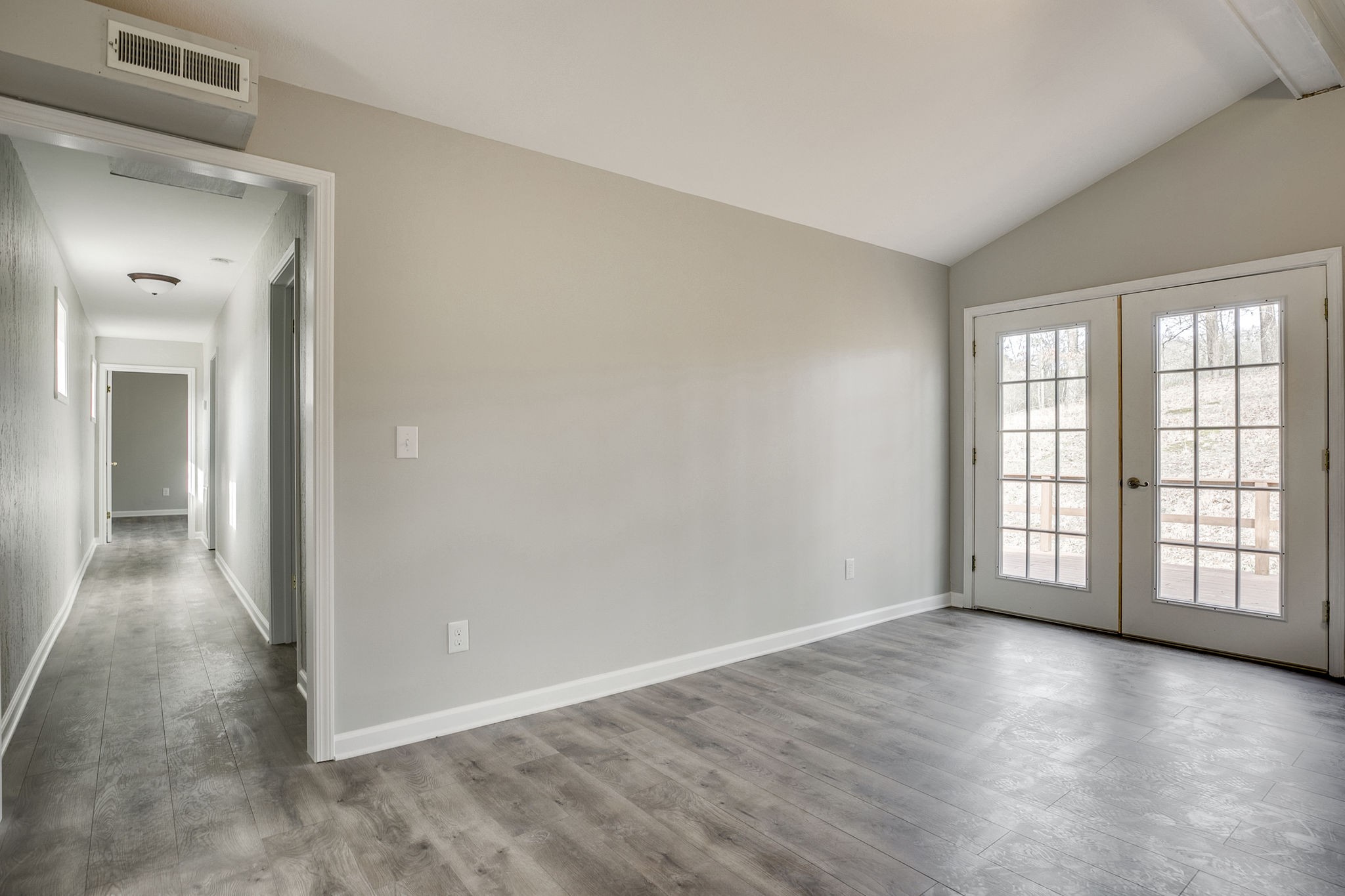 335 Eva Harbor Road Eva, TN 38333 - Photo 19 of 32 wooden floor in an empty room with a window
