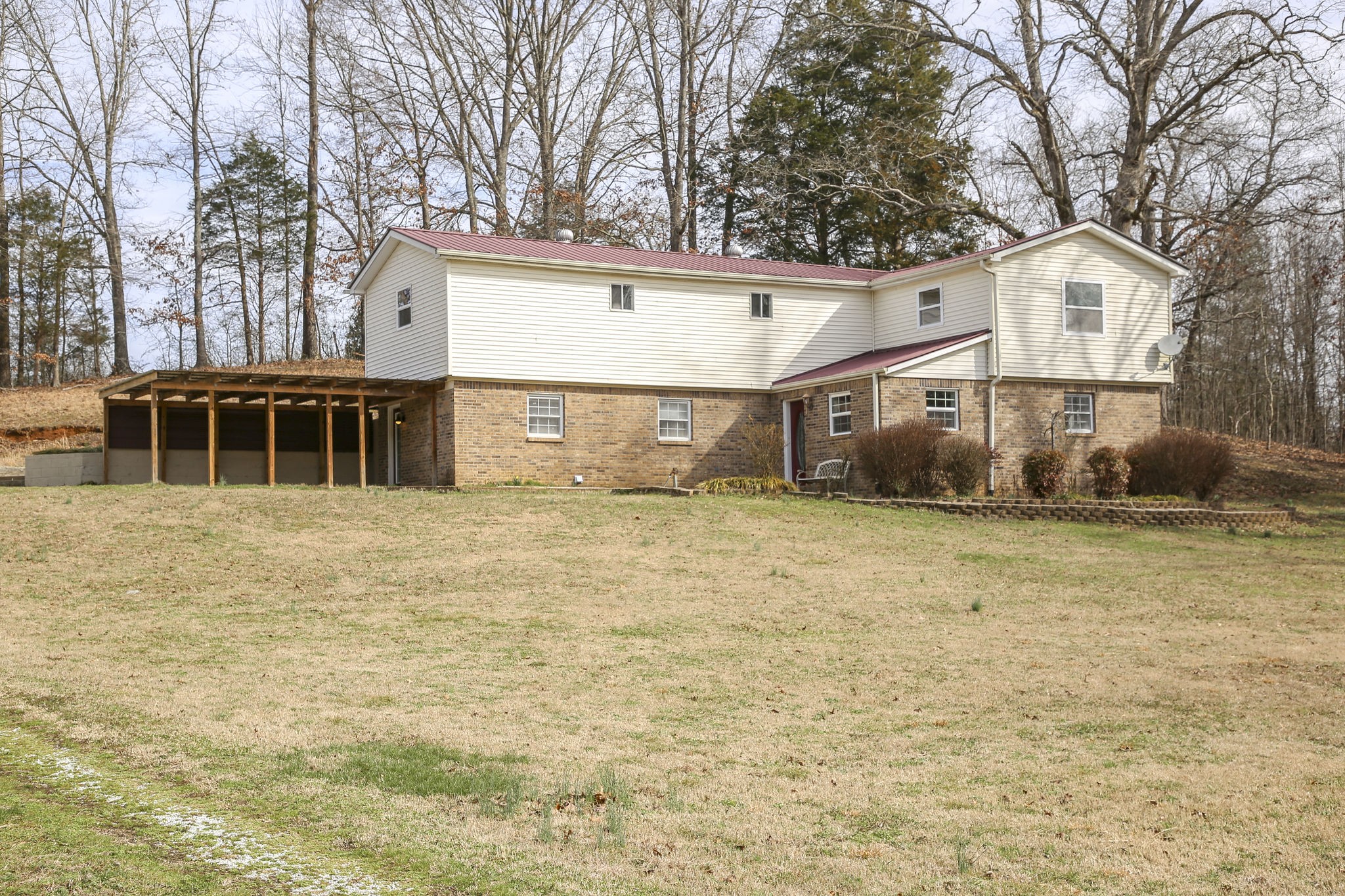 335 Eva Harbor Road Eva, TN 38333 - Photo 2 of 32 a view of a house with a yard