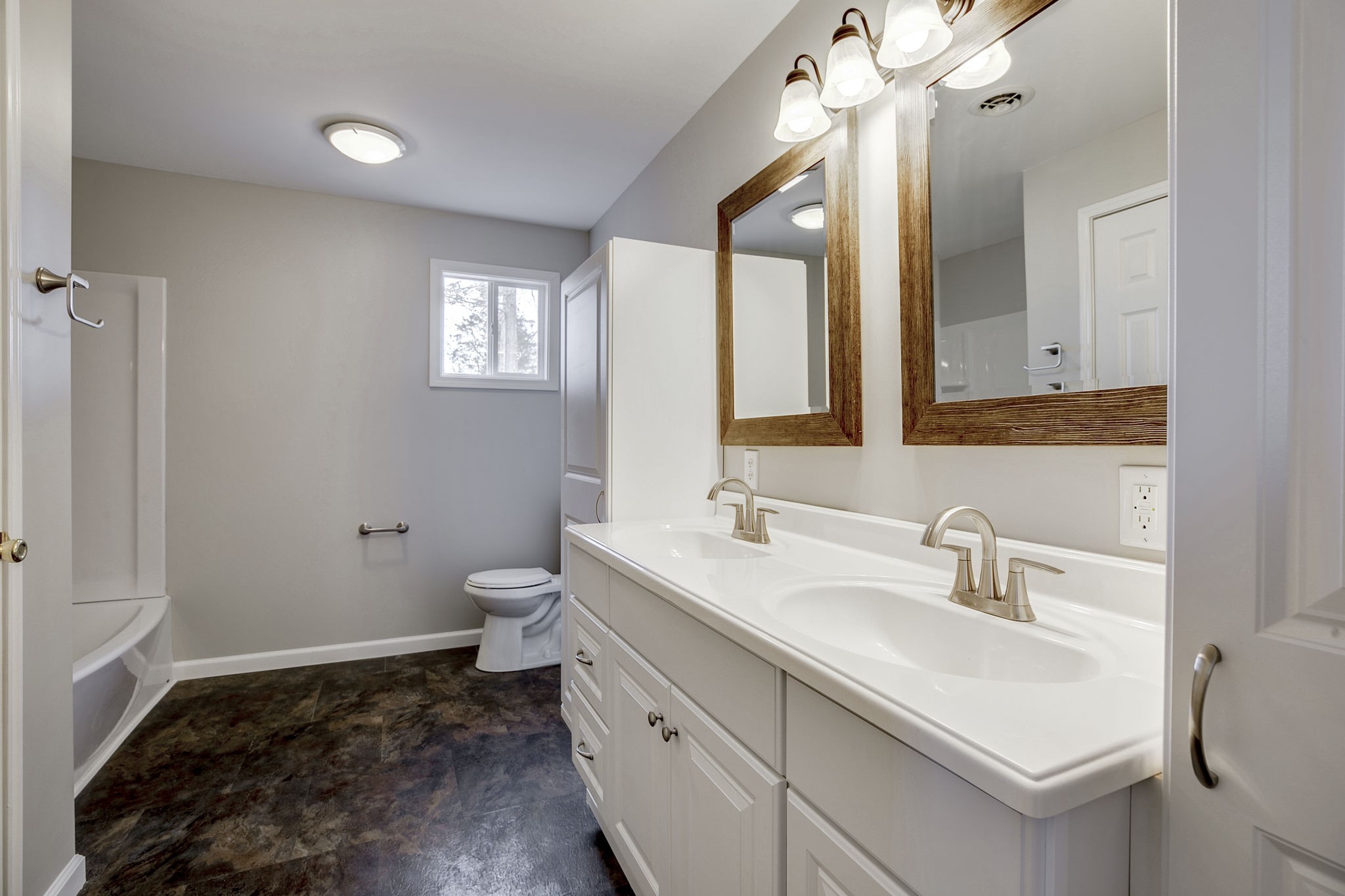 335 Eva Harbor Road Eva, TN 38333 - Photo 22 of 32 a bathroom with a sink a toilet and a mirror