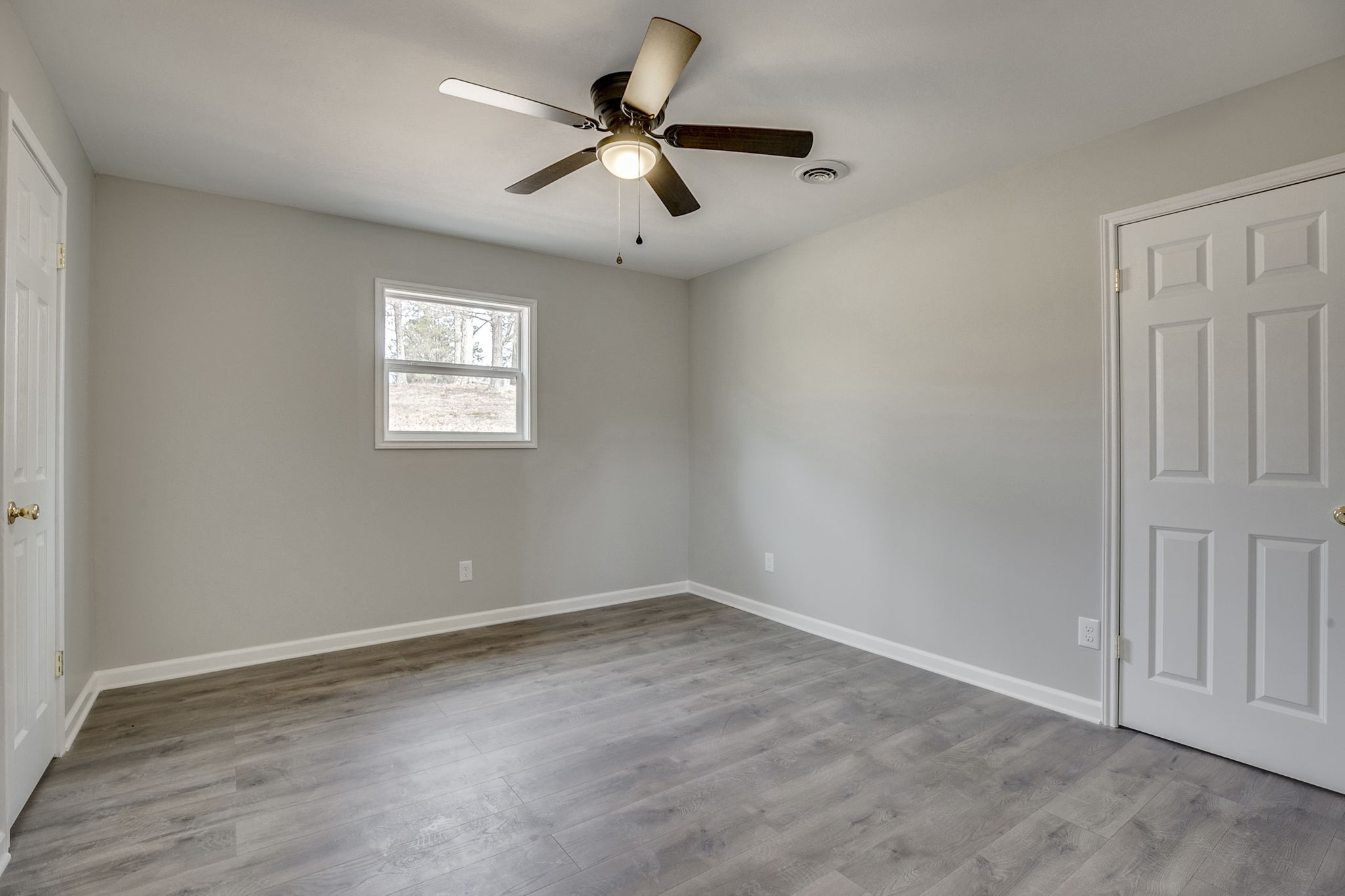 335 Eva Harbor Road Eva, TN 38333 - Photo 23 of 32 an empty room with a window