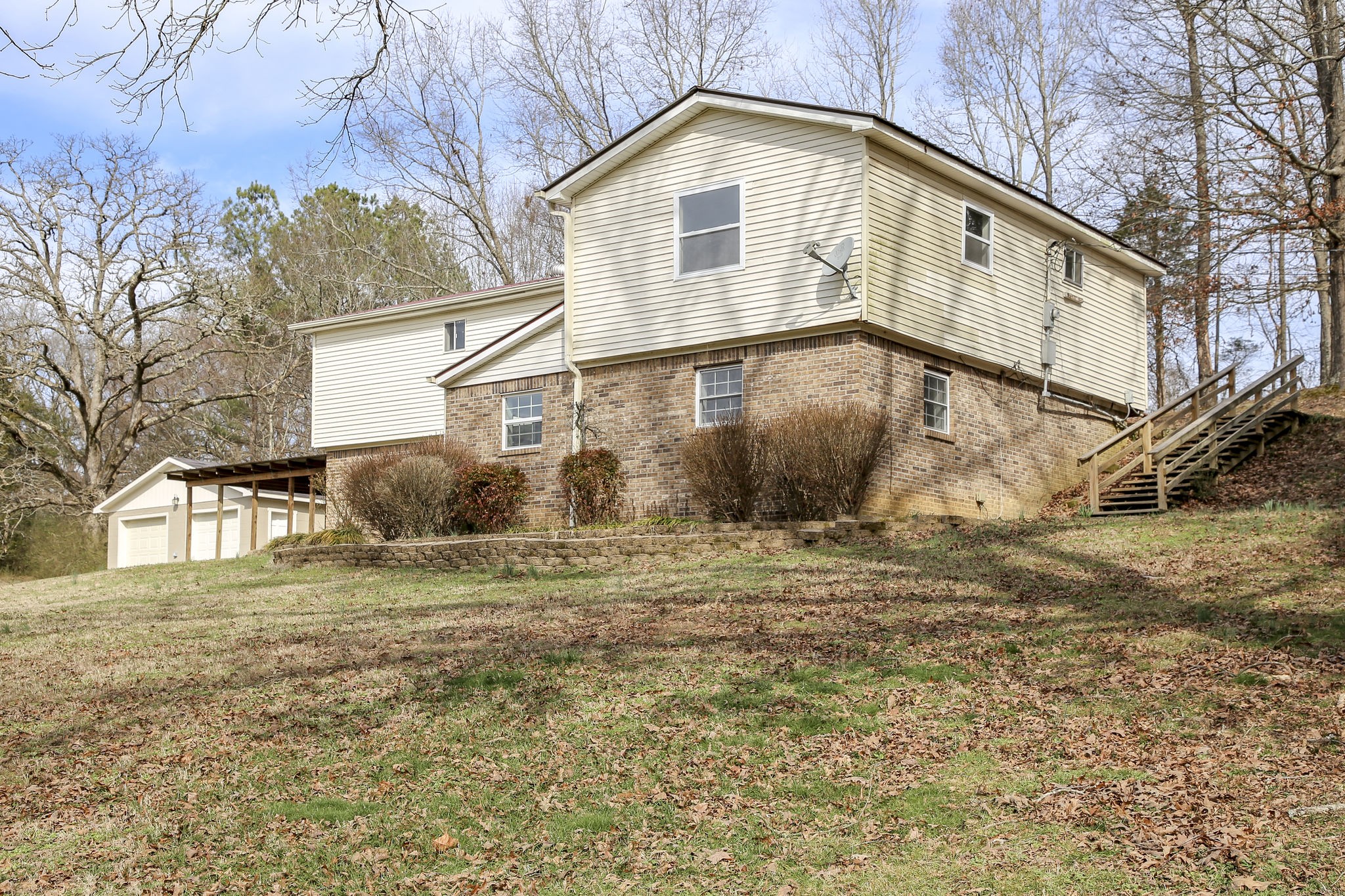 335 Eva Harbor Road Eva, TN 38333 - Photo 3 of 32 a house view with a outdoor space