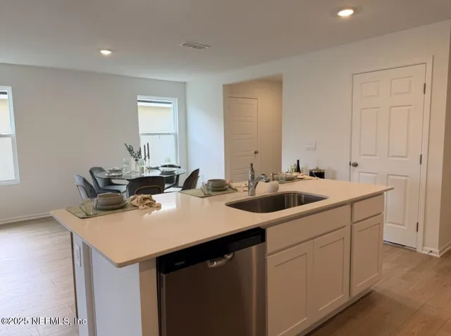 an empty room with closet area