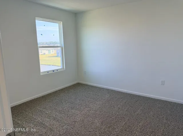 a view of a lake with a city view