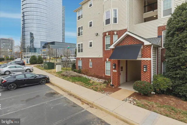 a view of a car park in front of a building