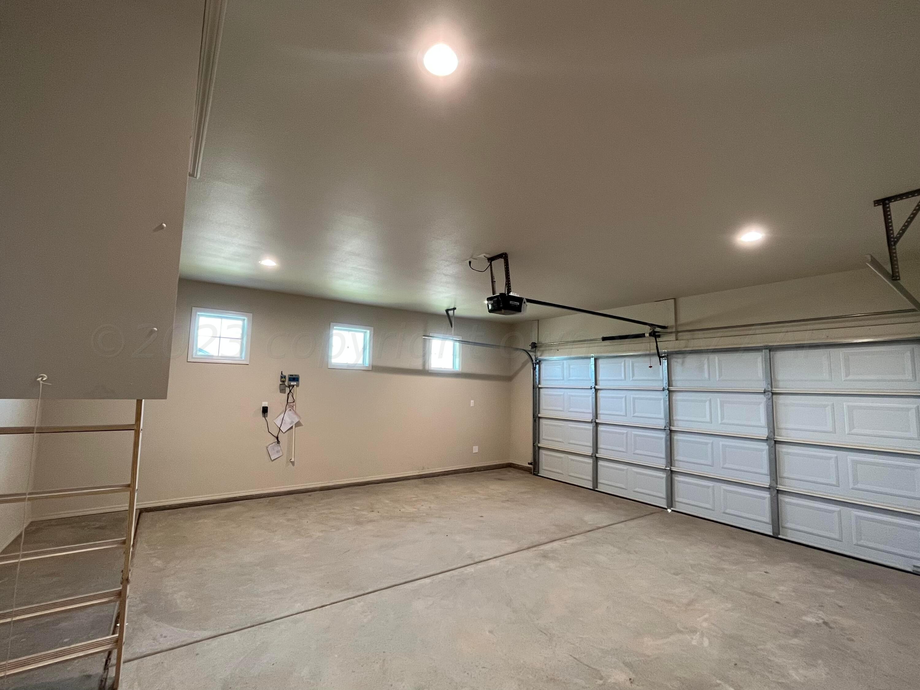 7610 Crestline Drive Amarillo, TX 79119 - Photo 7 of 9 a view of a garage