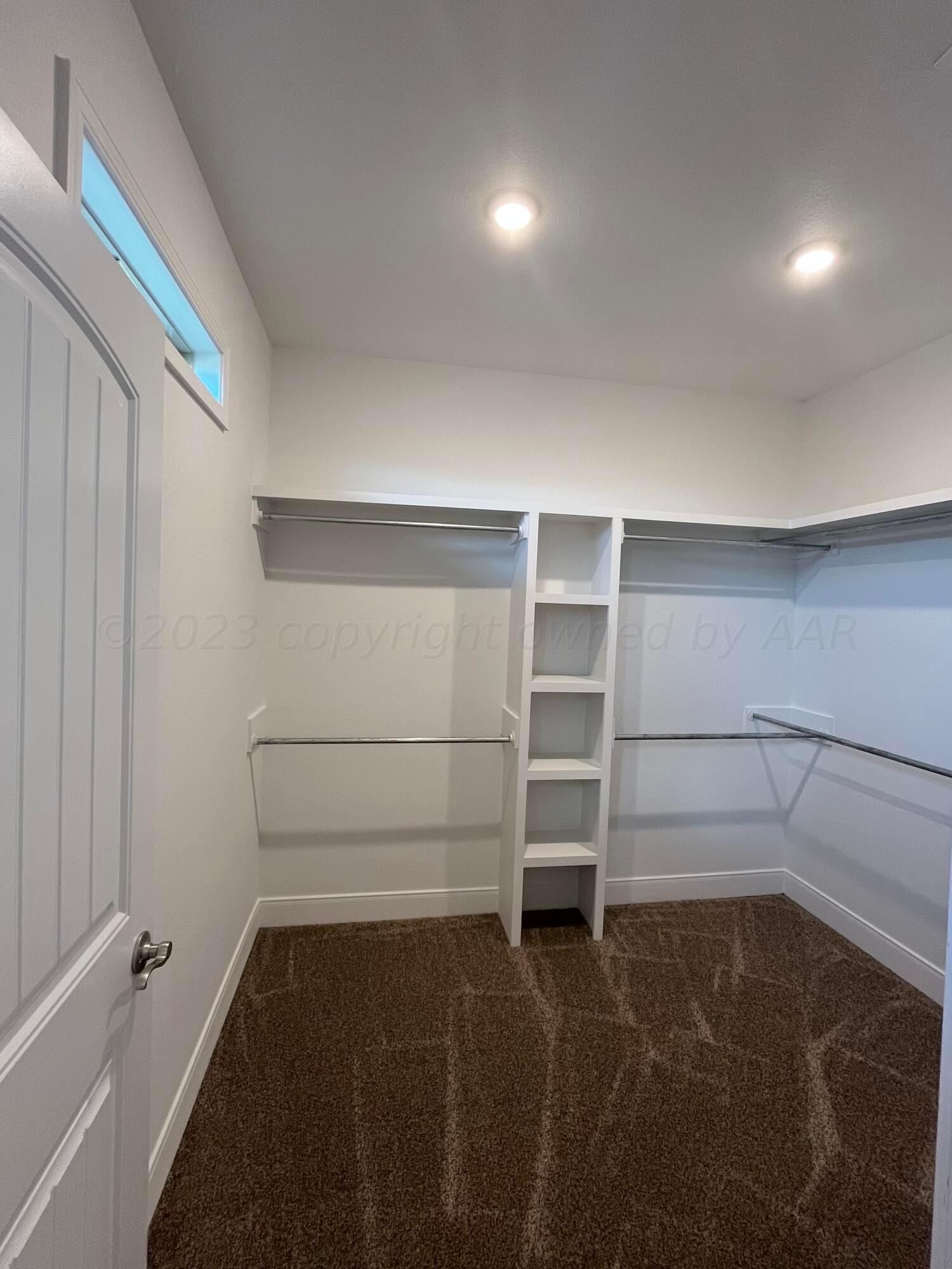 7610 Crestline Drive Amarillo, TX 79119 - Photo 8 of 9 a view of an empty walk in closet