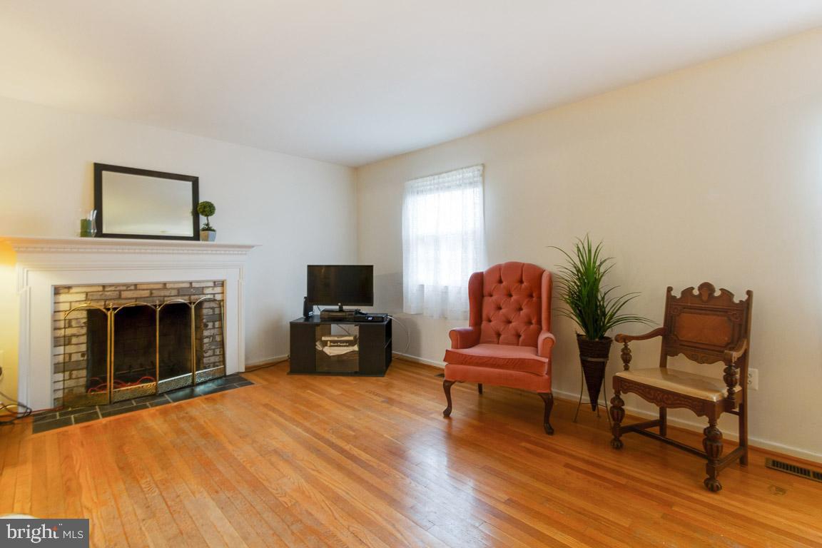 1923 Hull Road Vienna, VA 22182 - Photo 3 of 31 Living Room with wood burning fireplace