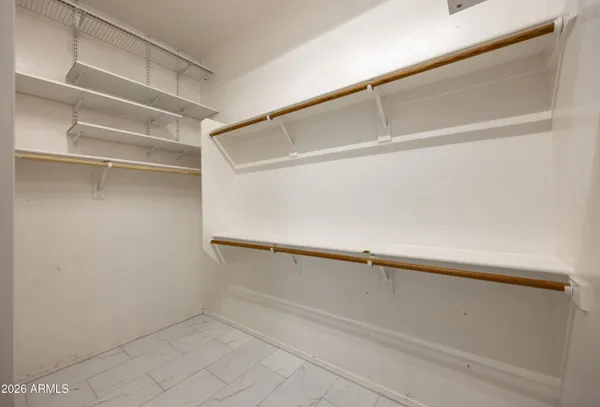 a view of an empty walk in closet