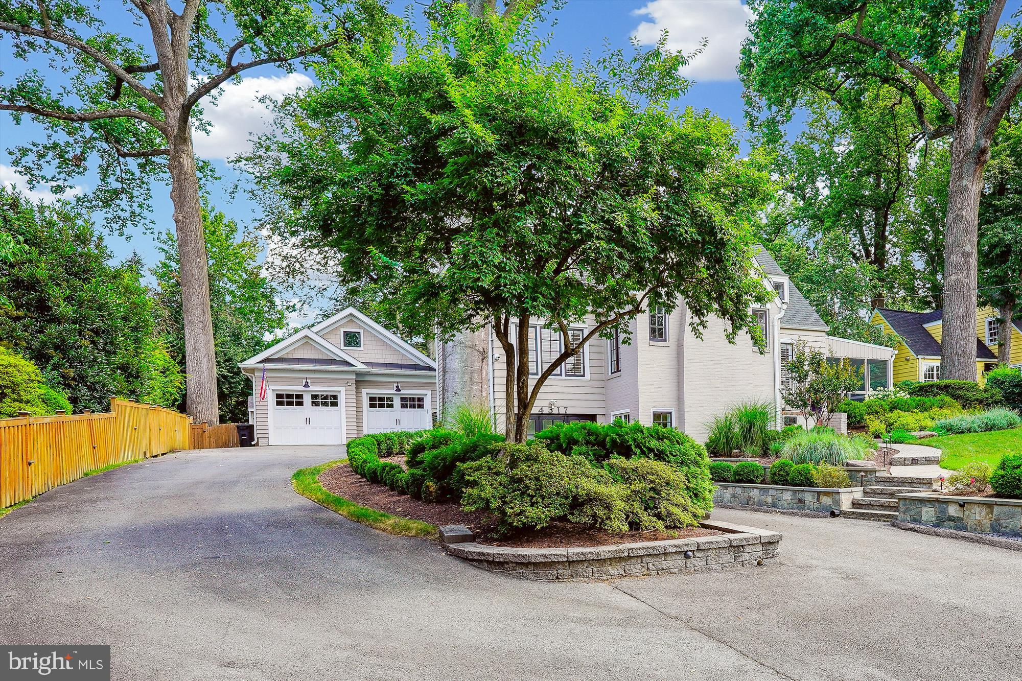 4317 Saul Road Kensington, MD 20895 - Photo 1 of 33 a house with a yard and a large tree