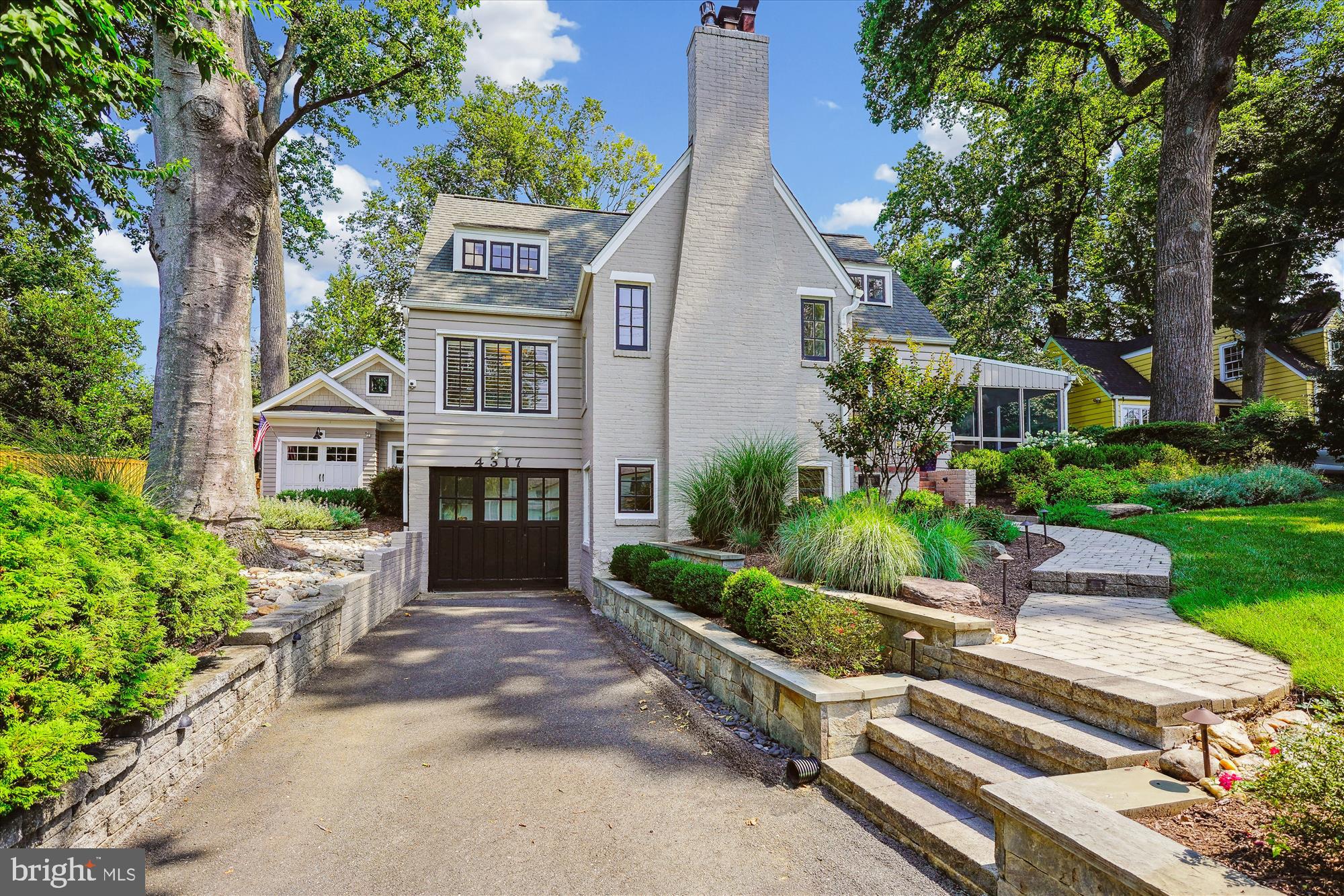 4317 Saul Road Kensington, MD 20895 - Photo 2 of 33 a front view of a house with a garden
