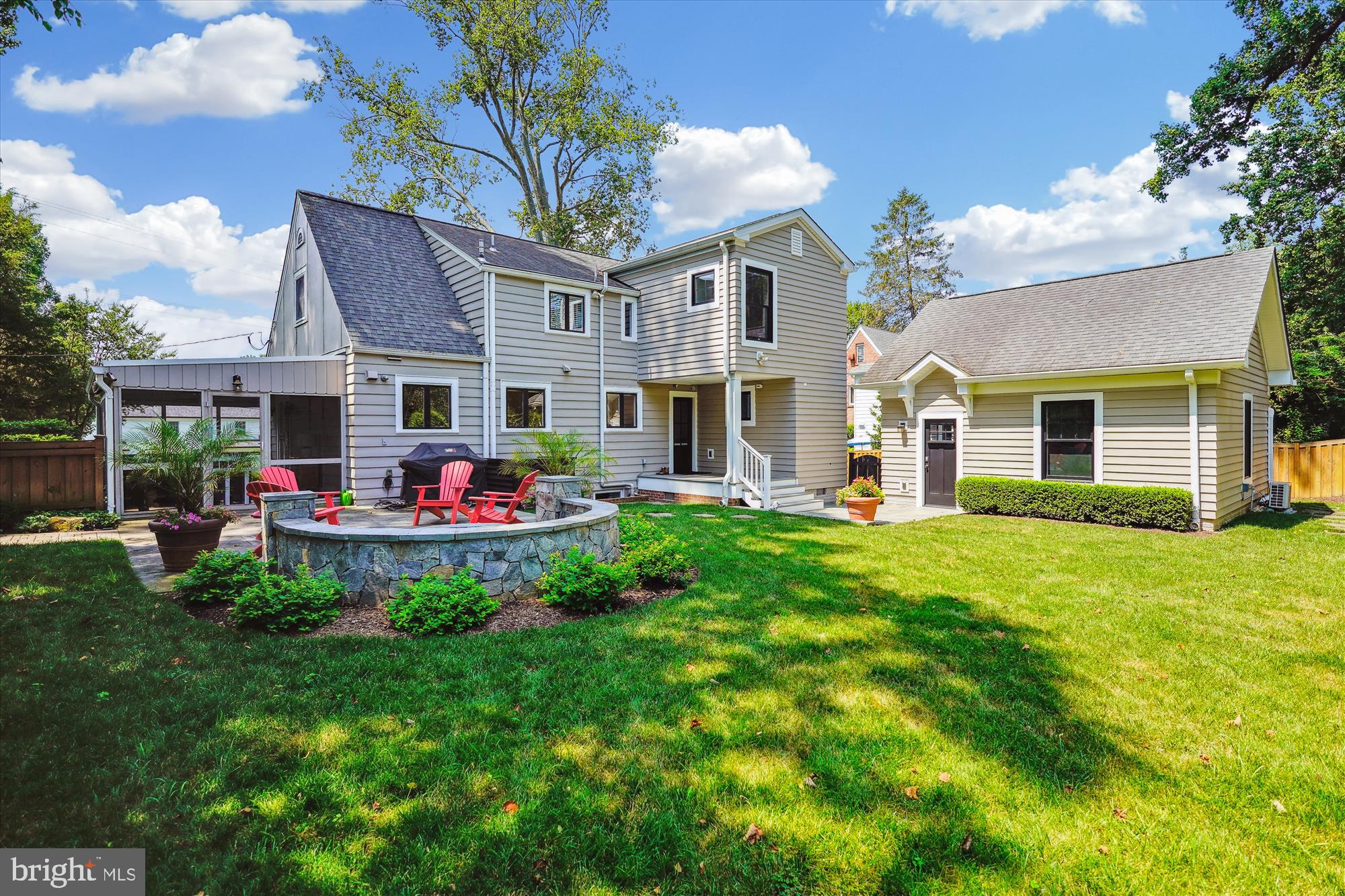 4317 Saul Road Kensington, MD 20895 - Photo 4 of 33 a front view of a house with a garden and plants