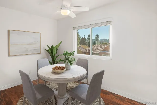 a kitchen with granite countertop a refrigerator stove and sink