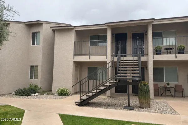 a house view with a outdoor space