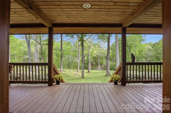 a view of porch with wooden floor
