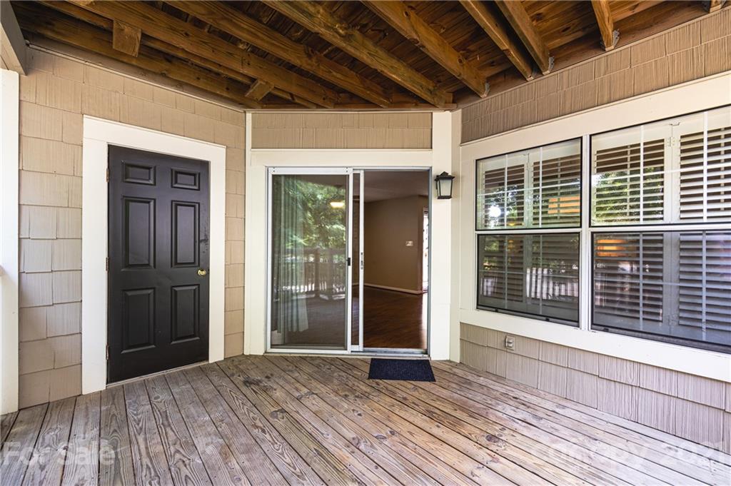 5003 Sharon Road, Unit G Charlotte, NC 28210 - Photo 13 of 42 a view of hallway with wooden floor