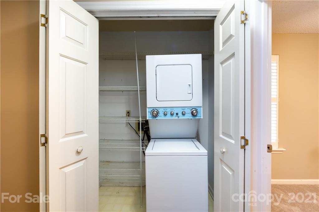 5003 Sharon Road, Unit G Charlotte, NC 28210 - Photo 20 of 42 a utility room with dryer and washer