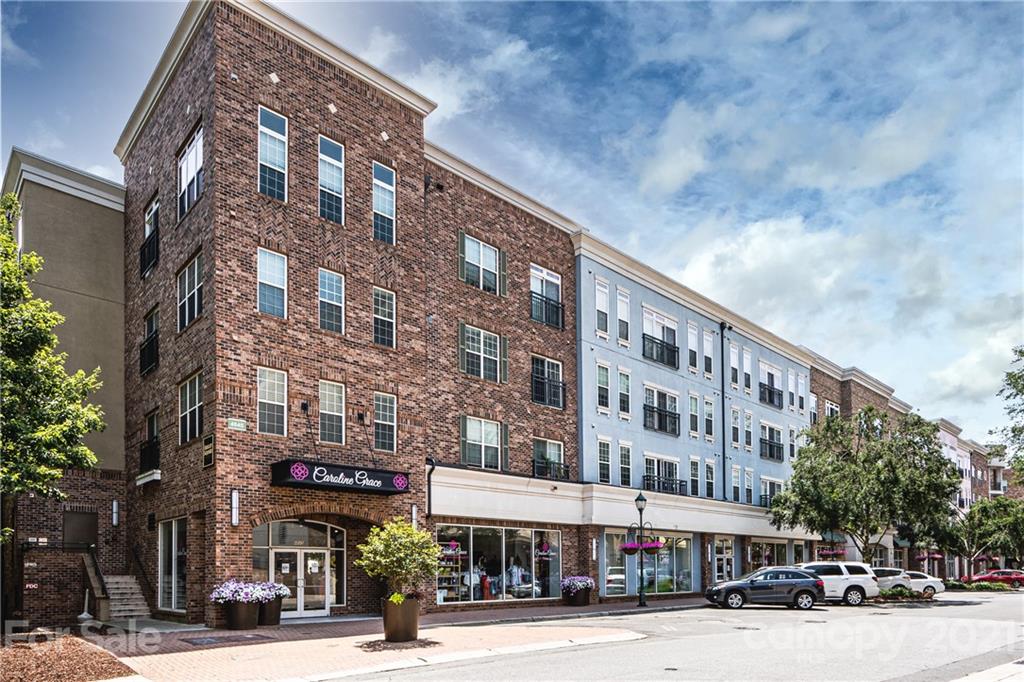 5003 Sharon Road, Unit G Charlotte, NC 28210 - Photo 42 of 42 a view of a building and a street