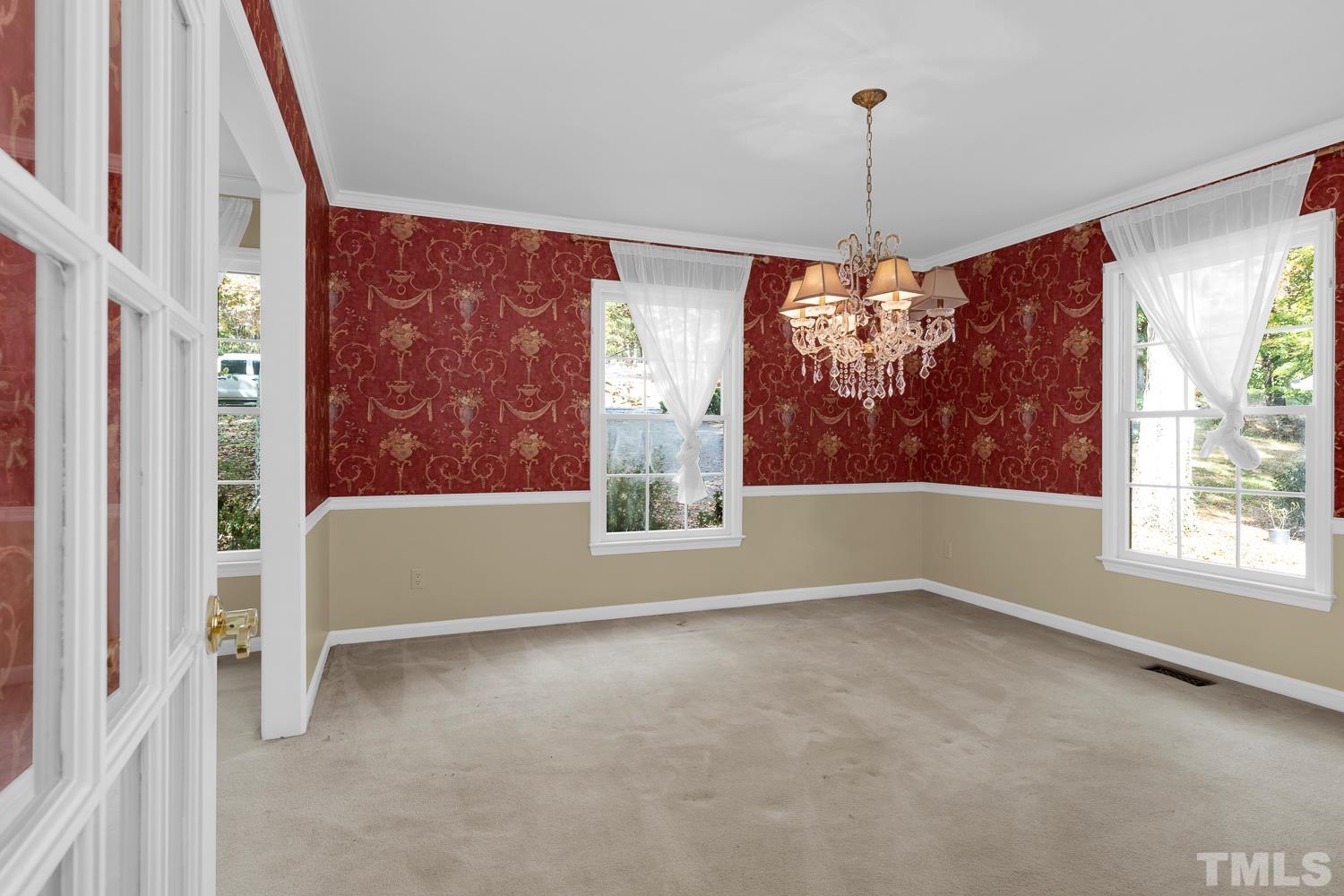 5908 Scalybark Road Durham, NC 27712 - Photo 11 of 30 a view of an empty room with a window