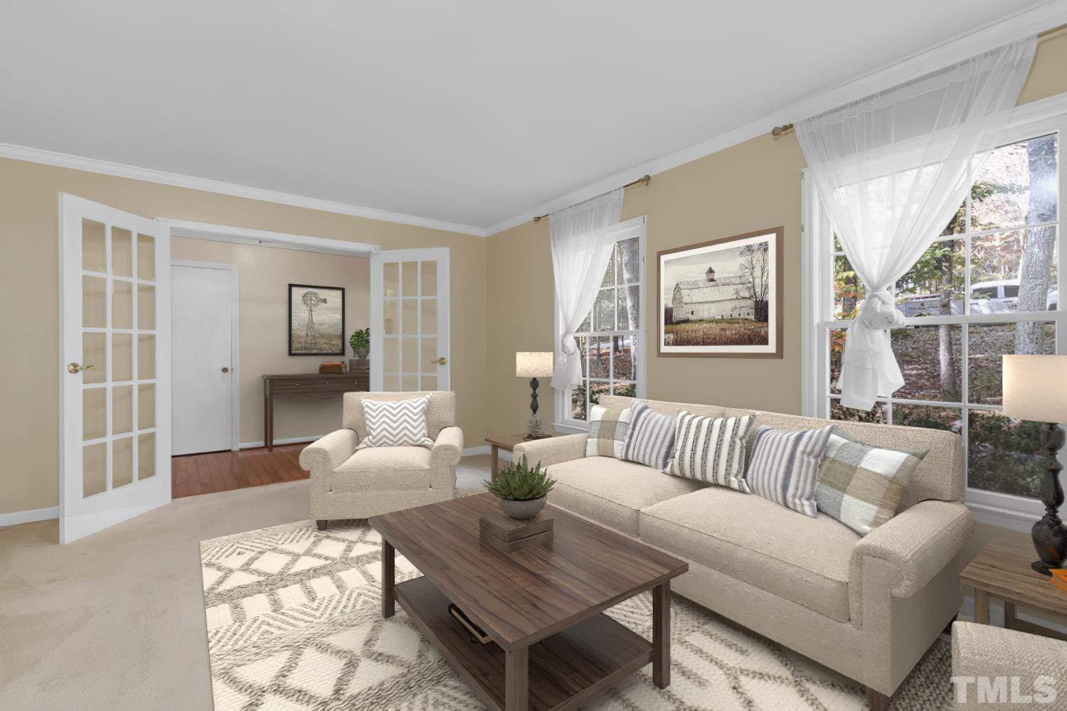 5908 Scalybark Road Durham, NC 27712 - Photo 7 of 30 a living room with furniture and a large window