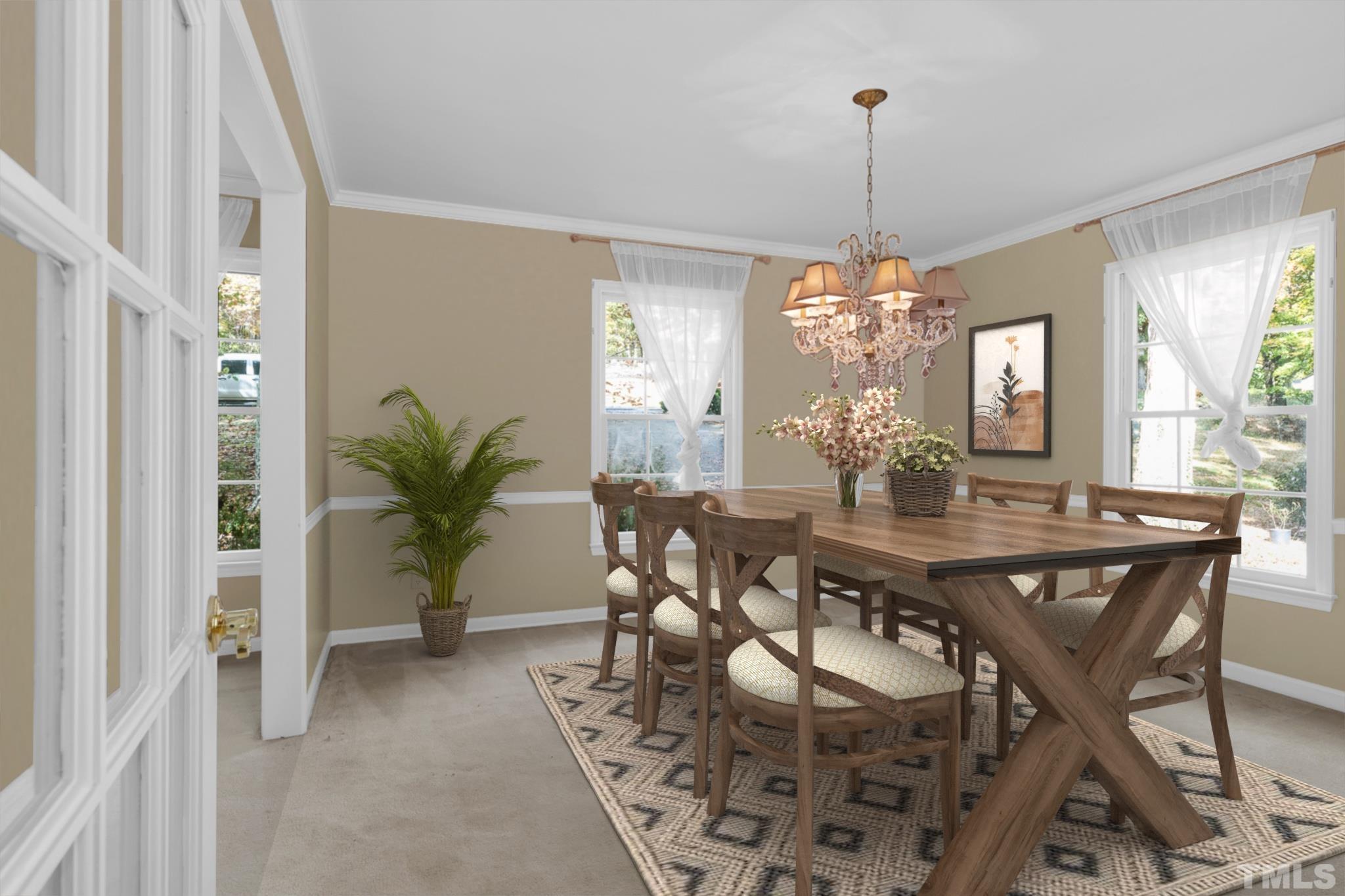 5908 Scalybark Road Durham, NC 27712 - Photo 10 of 30 a view of a dining room with furniture window and wooden floor