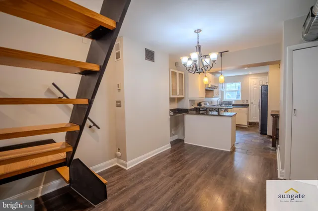 a view of a kitchen and dining room