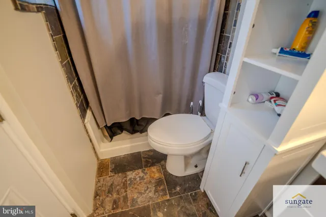 a bathroom with a sink and a toilet
