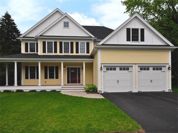 46 Whiting Way Needham, MA 02492 - Photo 1 of 24 a front view of a house with a yard