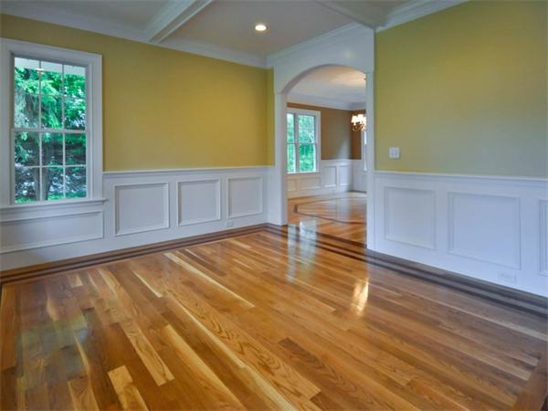 46 Whiting Way Needham, MA 02492 - Photo 12 of 24 a view of a livingroom with wooden floor and cabinet