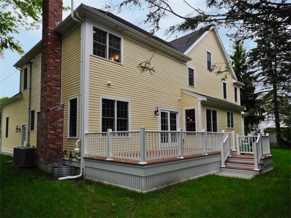 46 Whiting Way Needham, MA 02492 - Photo 24 of 24 a view of a house with a yard and sitting area