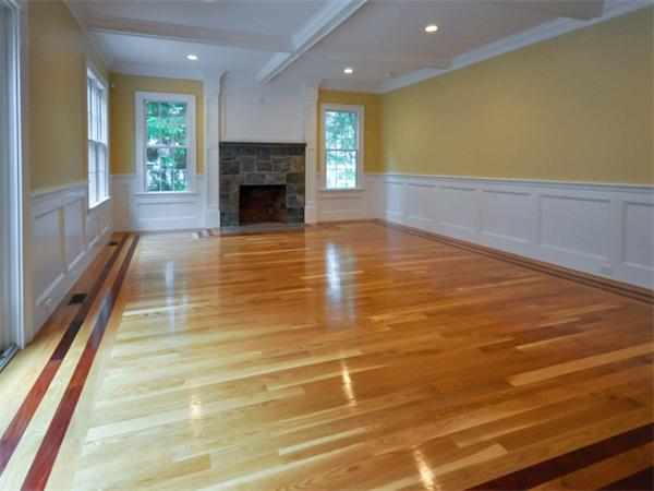 46 Whiting Way Needham, MA 02492 - Photo 4 of 24 a view of an empty room with a fireplace and a window