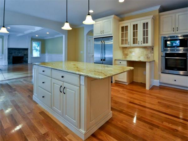 46 Whiting Way Needham, MA 02492 - Photo 10 of 24 a kitchen with cabinets and wooden floor